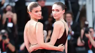 Mara Sisters Coordinate Venice Looks as Herzog's 'Bucking Fastard' Divides Critics