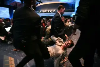 Hegseth’s AUSA Drone Panel Disrupted by Anti-War Protesters