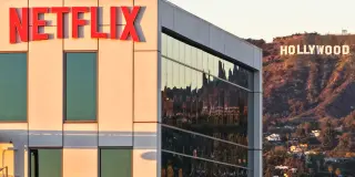 Netflix Downgraded as Disney Expands Streaming Edge
