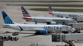 Jet-fuel spike trims the cheap seats as airlines pare back flights