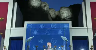 Trump frames 250th anniversary as a stand against communism and immigration