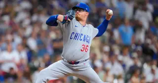 Cubs edge Brewers in extras as Wicks nails down save