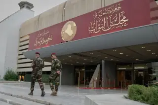 Kurdish Leader Nizar Amidi Installed as Iraq's President Amid Post-Election Turmoil