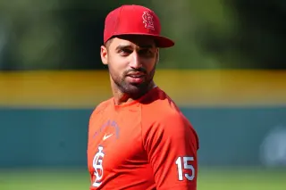Cap-tips mark tense moment after umpire's dig at Cardinals rookie