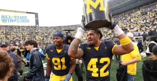 Michigan Seeks Redemption Against Minnesota in Little Brown Jug Showdown
