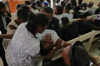 Mourners gather at Haitian church after deadly gang raid