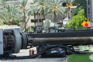 Fiery crane collapse injures four at Miami construction site
