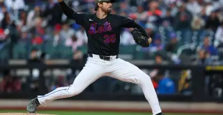Cubs add Holmes and Taylor in Mets swap for prospect Rojas