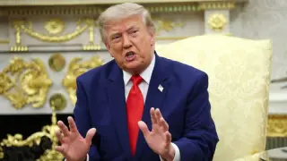 Trump vows to strike Iranian bridges and power plants after Strait of Hormuz attacks