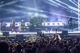Day 2 of Lollapalooza Elevates Chicago Talent with Surprises and Rain