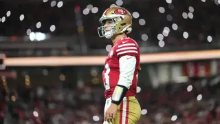 49ers Survive Evans Injury and Late Commanders Surge to Stay Undefeated