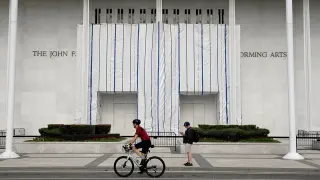Tarps shield the moment as Trump's Kennedy Center name is removed amid mockery