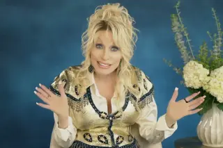 Dolly Parton’s Pre-Recorded Video Surprises Crowd at Americana Awards
