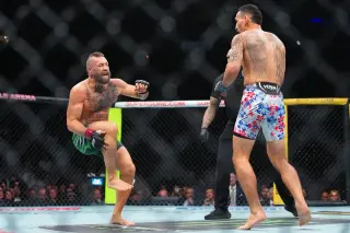 McGregor's knee buckles seconds into UFC 329 as Holloway claims quick win amid crowd boos