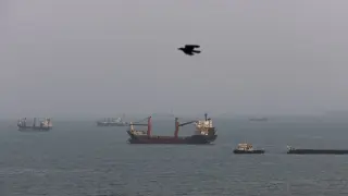 Oil tanker struck in Hormuz as Iran vows to weather U.S. sanctions