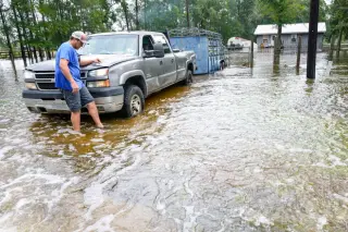 Texas Braced as Edouard Drenches Regions, Forcing Closures and Evacuations