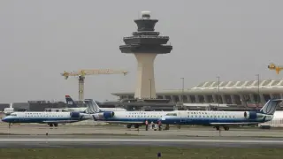 Dulles Runway Moment: Father and Daughter Pilots Spot Each Other Before Departures