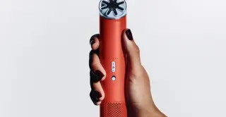 Dyson shrinks its blade-free cooling to a wearable handheld fan