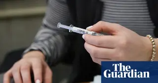 US medical groups unite to push fall flu and Covid shots amid guidance flux