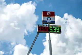 Oil crosses $100 as U.S. stocks slip at the open