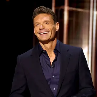 Seacrest Flaunts Ripped Arms in Candlelit Dinner Photo, Sparks Romance Buzz