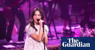 Olivia Rodrigo Defends Babydoll Dress, Criticizes Culture's Sexualization of Girls