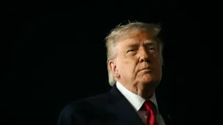 Trump ties FISA renewal to his voting-law push amid DNI nomination debate