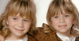Olsen siblings reunite at Trent's wedding in rare family portrait