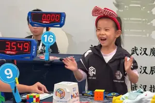 Six-year-old Lian Yunzhi shatters women’s Rubik’s Cube record with 4.27-second average