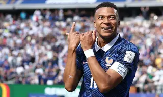 Mbappe Breaks France and World Cup Scoring Records in Senegal Win