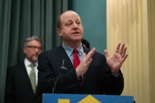 Polis defends reduced Peters sentence amid bipartisan backlash