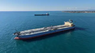 Oil flows surge through Hormuz as US blockade strains Iran’s economy and peace talks