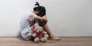 Timing of Childhood Trauma Shapes Distinct Brain Signatures in Adulthood