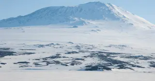 Antarctica’s blue-ice conveyor turns space rocks into Earth’s largest meteorite archive