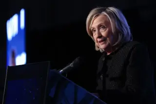Clinton cautions GOP ’communist’ label could sway midterms