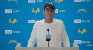 Chargers Coach Harbaugh Clashes with ESPN Reporter Over Herbert Protection