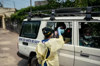 War, No Vaccine, and Weakened Health Systems Threaten Ebola Containment