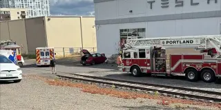 High-speed crash hits Tesla dealership in South Portland, 3 injured