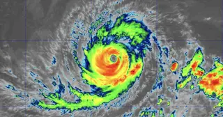 Hurricane Lowell skirts Hawaii with dangerous surf and heavy rain
