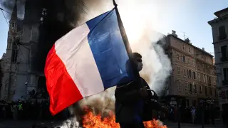 AI Infrastructure Debt and French Sovereign Bonds Face Simultaneous Credit Stress