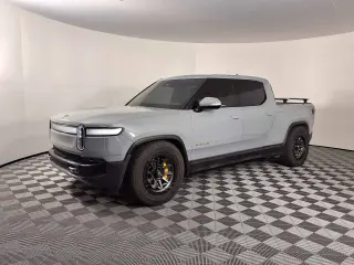 Tesla Edges Rivian in Night Drive Self-Driving Test