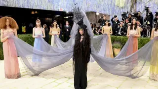 Madonna Channels Surreal Witchery in Violet Cape Carried by Seven at Met Gala 2026