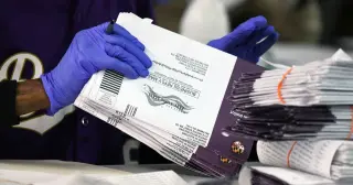 Judges pause Trump USPS mail-ballot rule as Supreme Court weighs appeal