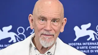 Malkovich Dismisses Oscar Hype as McDonagh’s CIA Satire Debuts in Venice
