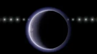 Tiny Distant World Displays Pluto-like Thin Atmosphere