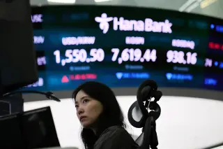 Iran tensions weigh on markets as futures dip and oil climbs
