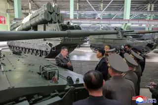 North Korea unveils long-range artillery and its first destroyer, signaling heightened tensions with Seoul