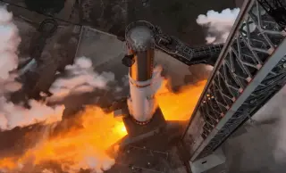 SpaceX’s 33-Engine Starship Booster Completes Ground Test, Sets Stage for May Liftoff