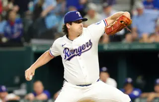 Rangers Place Quantrill on IL, Recalling Santos