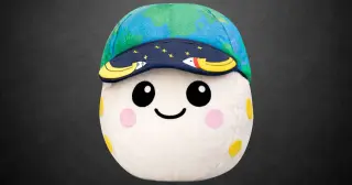 Artemis II's Rise Moon Mascot Lands on NASA Exchange Store